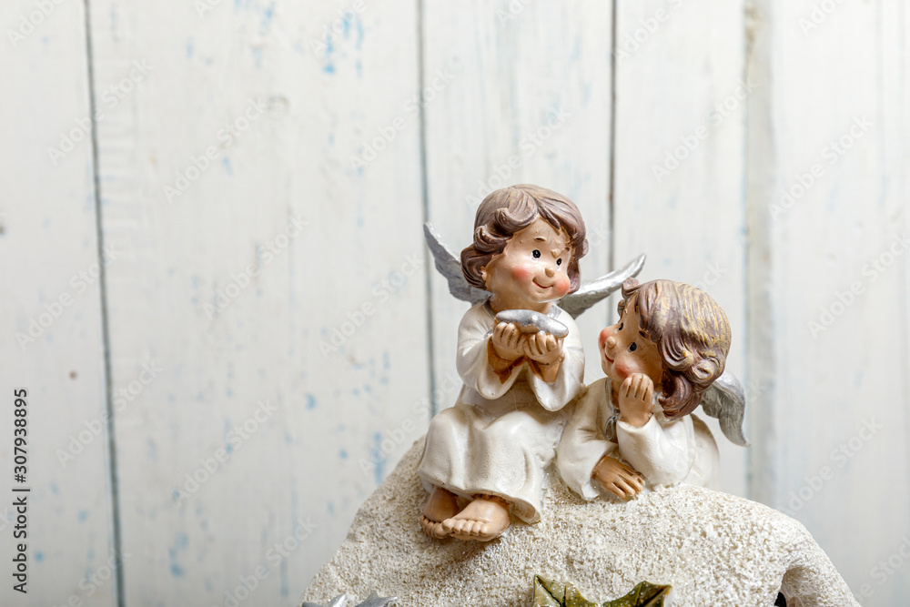 Interior-a statuette in the form of two angels, home or office decoration.