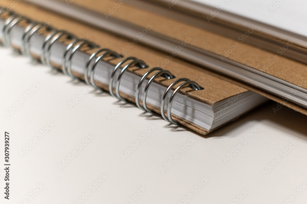 Close up stack of Ring Bound Sketchbooks Close up stack of Ring Bound Sketchbooks