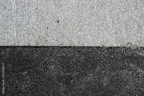 Grey marble tile and new asphalt surface texture detail close up