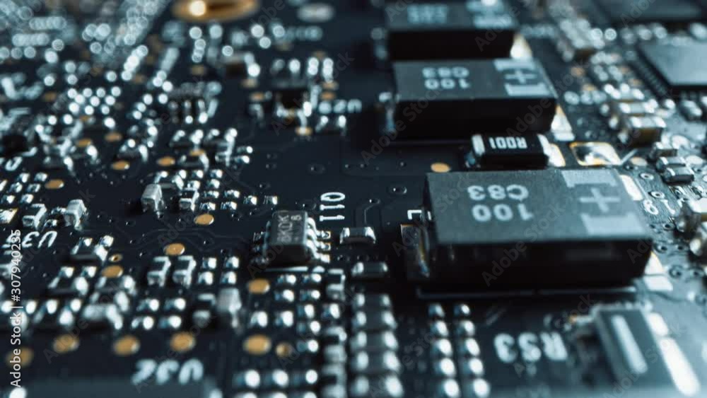 Macro Camera Moving Slowly over Printed Circuit Board, showing Computer Motherboard Components: Microchip, CPU Processor, Transistors. Inside of Electronic Device. Picture Becoming More Illuminated
Macro Camera Moving Slowly over Printed Circuit Board, showing Computer Motherboard Components: Microchip, CPU Processor, Transistors. Inside of Electronic Device. Picture Becoming More Illuminated