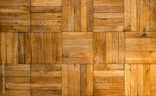 Tableau sur toile Fragment of old wooden parquet floor