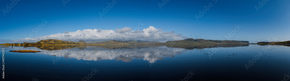 Bay during an outflow, located near Black beach Reynisfjara and the village of Vik. Sudurland, Iceland, Europe. September 2019 Bay during an outflow, located near Black beach Reynisfjara and the village of Vik. Sudurland, Iceland, Europe. September 2019