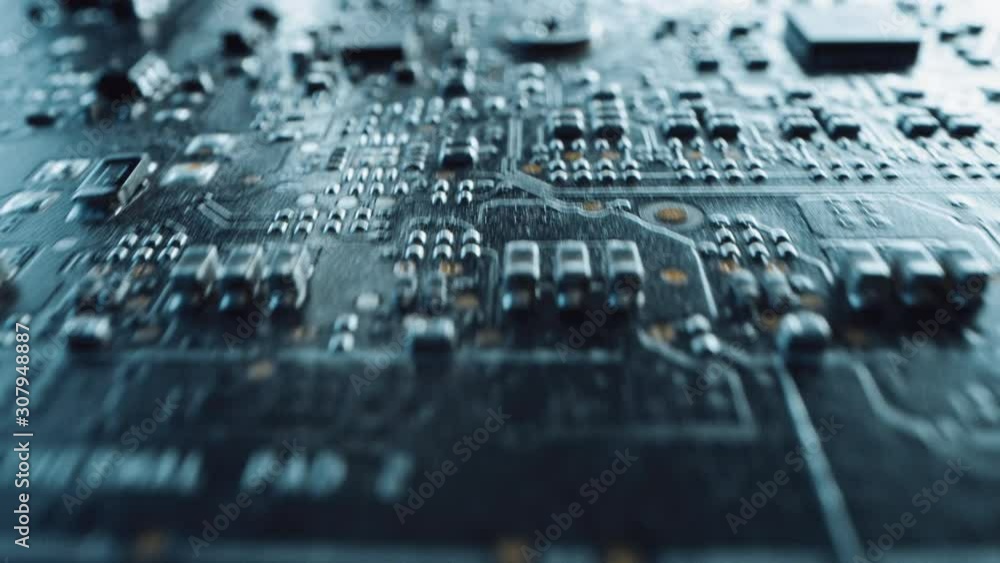 Macro Camera Moving Slowly over Printed Circuit Board, showing Computer Motherboard Components: Transistors, Resistors, Capacitors, Semiconductor. Inside of Electronic Device, Parts of Supercomputer
Macro Camera Moving Slowly over Printed Circuit Board, showing Computer Motherboard Components: Transistors, Resistors, Capacitors, Semiconductor. Inside of Electronic Device, Parts of Supercomputer