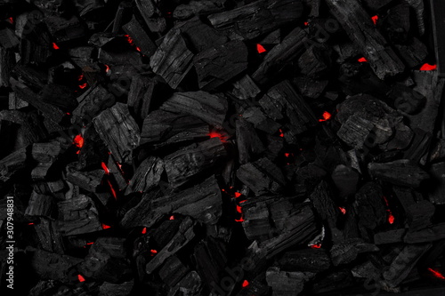 Charcoal background illuminated with red light underneath