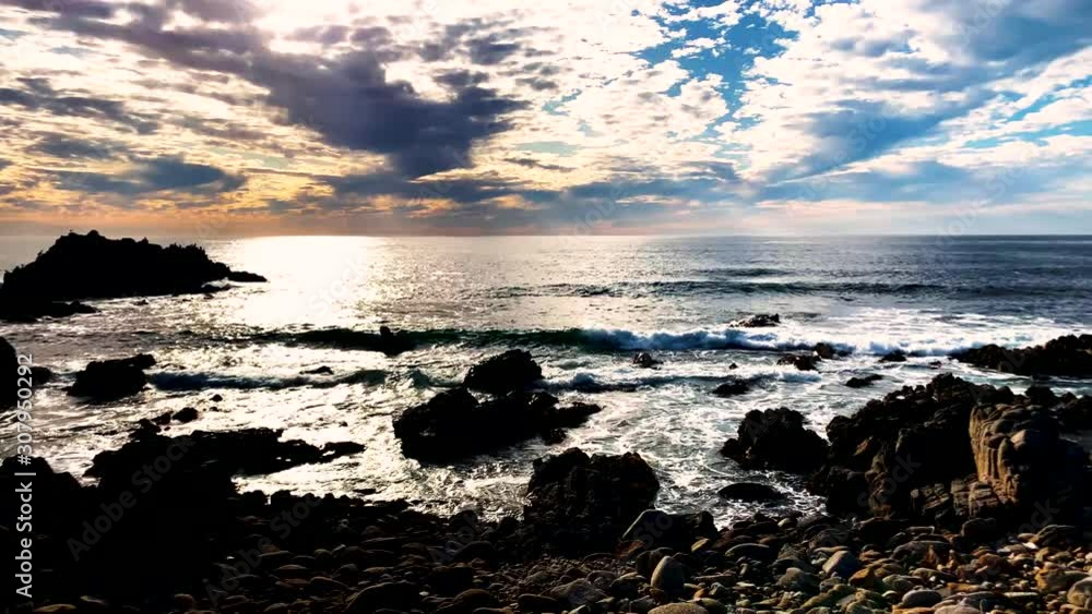 Colorful sky during the sunset at the sea. Rocky coast. Colorful sky during the sunset at the sea. Rocky coast.