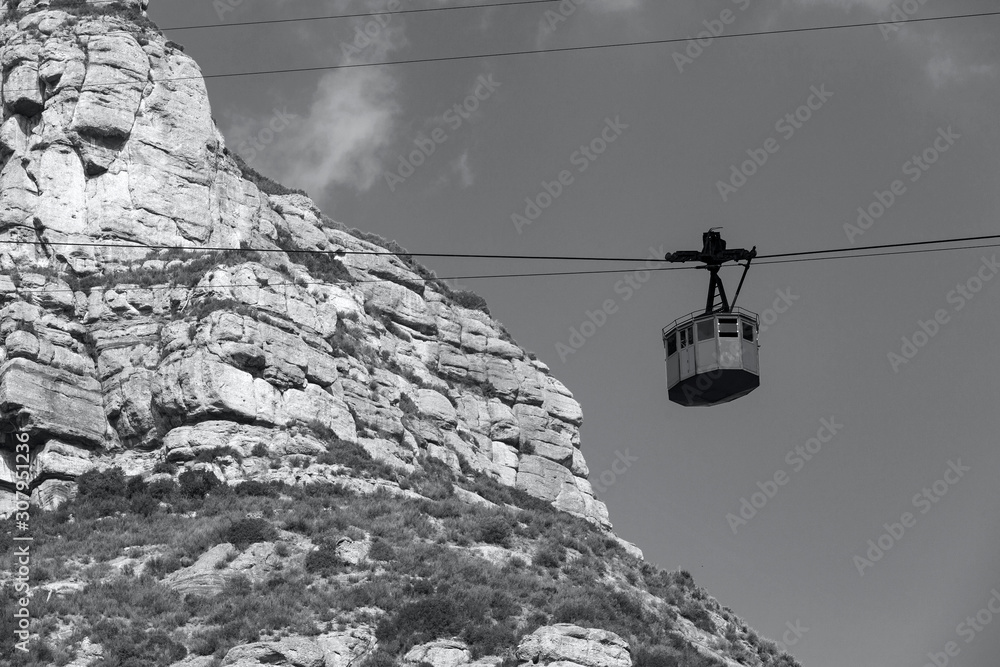 Cable car on ropeway leading to the top of mountain