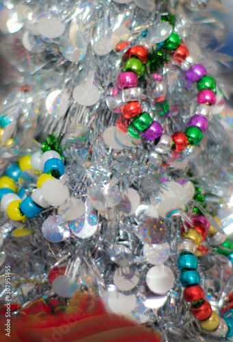 Christmas decorations close up in detail on a homemade Christmas tree.