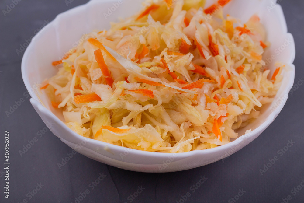 Sauerkraut in a white bowl Sauerkraut in a white bowl