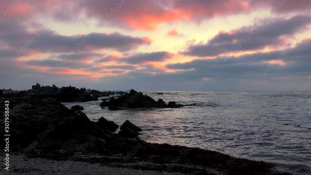 Rugged volcanic rocky shore in San Cristobal (or Chatham Island), the easternmost island in the Galapagos Archipelago, 2019 Rugged volcanic rocky shore in San Cristobal (or Chatham Island), the easternmost island in the Galapagos Archipelago, 2019