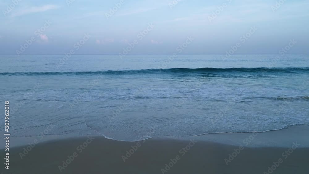 Aerial view drone shot video of tropical andaman seascape scenic beach phuket thailand with wave crashing on sandy shore Aerial view drone shot video of tropical andaman seascape scenic beach phuket thailand with wave crashing on sandy shore