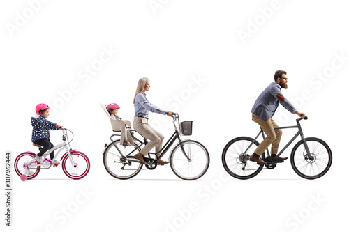 Father, mother and two girls riding a bicycle with a child