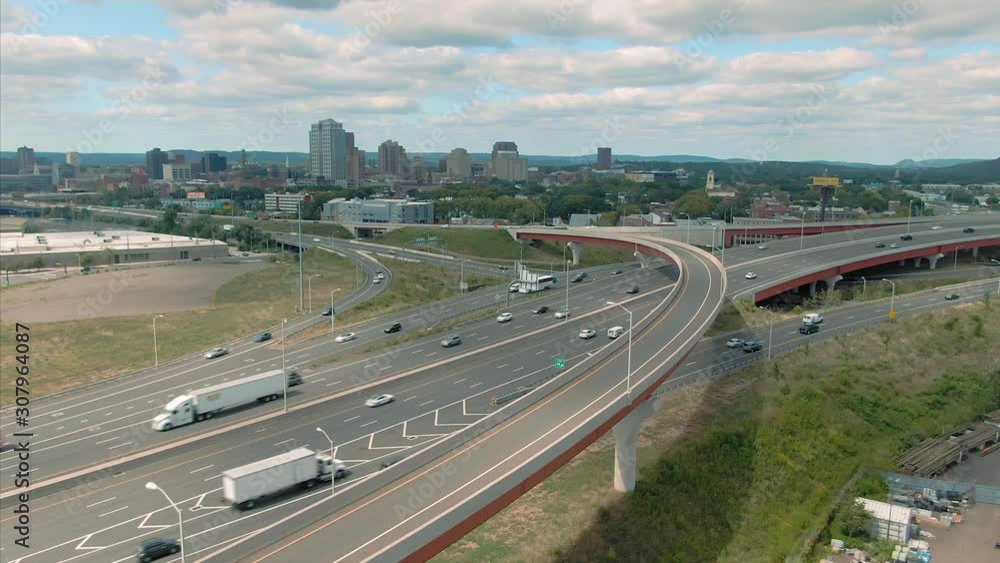 Aerial: Freeway traffic & downtown in New Haven. Connecticut, US. Aerial: Freeway traffic & downtown in New Haven. Connecticut, US.