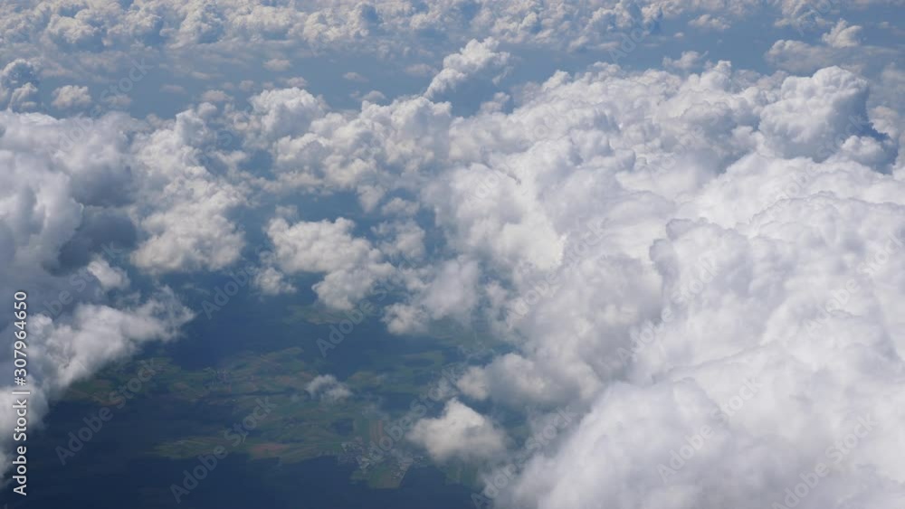 day time aircarft passenger window view white clouds aerial panorama 4k netherlands day time aircarft passenger window view white clouds aerial panorama 4k netherlands