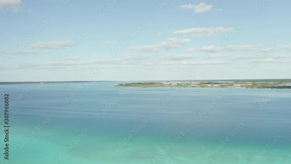 Coming Up from Incredible Aqua Blue Water to Get a Scenic View of Marshes Coming Up from Incredible Aqua Blue Water to Get a Scenic View of Marshes