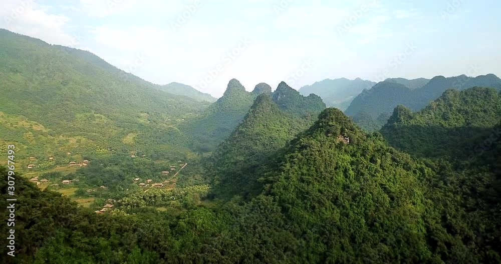 Lush green forested landscape of Vietnam. aerial dolly back Lush green forested landscape of Vietnam. aerial dolly back