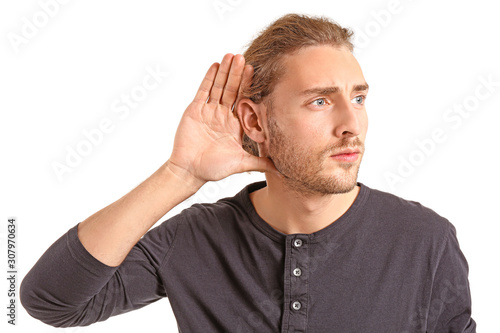 Young man with hearing prob...
