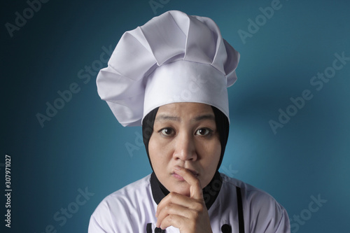 Woman Chef Thniking Gesture photo