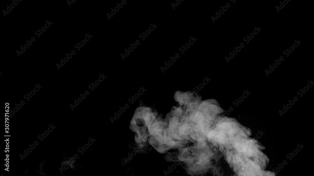 White smoke floating on isolated black background,water spray steam slow motion, Spooky element for halloween day White smoke floating on isolated black background,water spray steam slow motion, Spooky element for halloween day