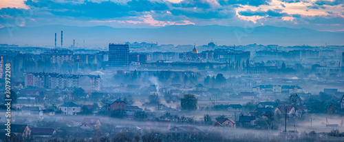 Panorama of the evening Ukrainian city in the haze