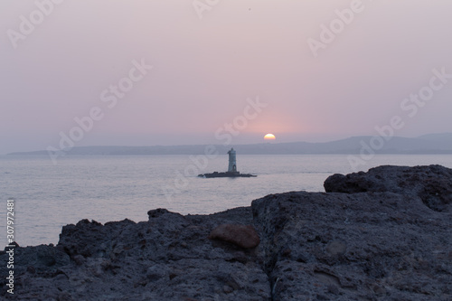 Leuchtturm bei Sonnenuntergang Sant Antioco Sardinien