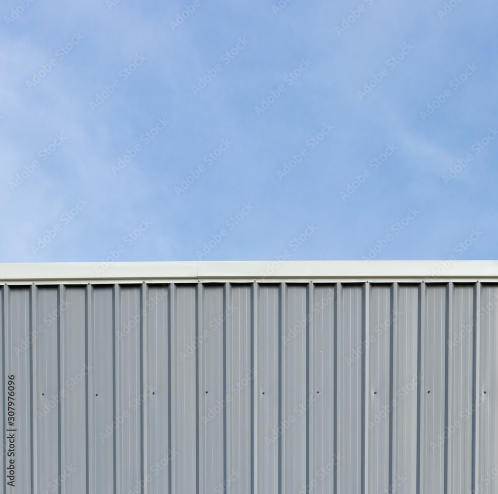 Metal sheet roof and wall steel with louver build factory and warehouse with blue sky. Metal sheet roof and wall steel with louver build factory and warehouse with blue sky.