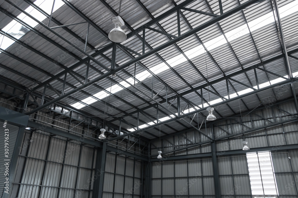 Warehouse metal roofing, Large steel roof structure, bottom view with skylight translucent roof. Warehouse metal roofing, Large steel roof structure, bottom view with skylight translucent roof.