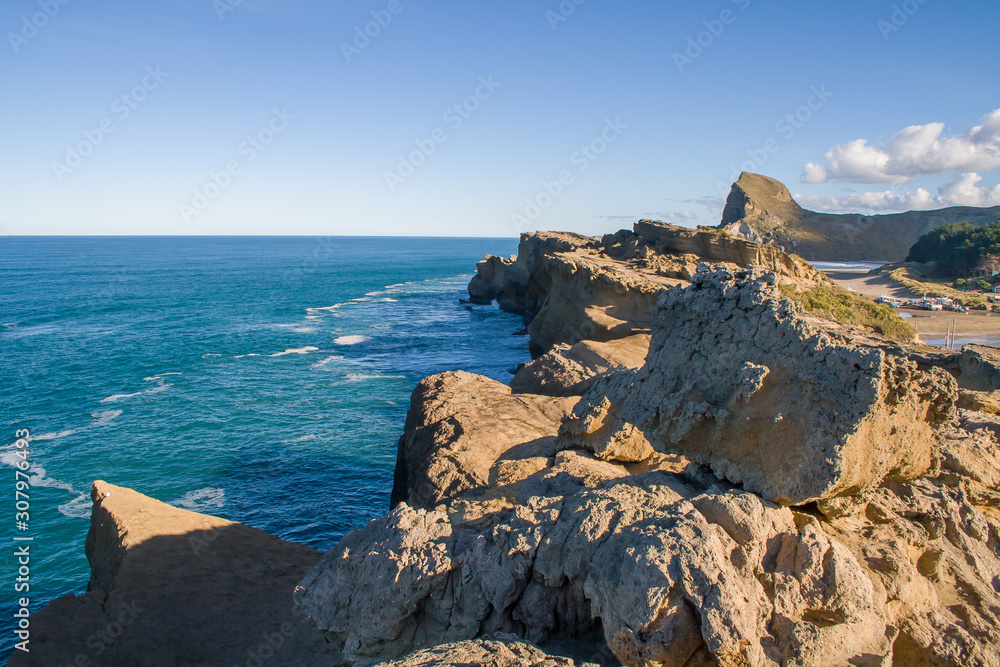 Dramatic rugged rough Castlepoint coastline looking down from the lighthouse Dramatic rugged rough Castlepoint coastline looking down from the lighthouse