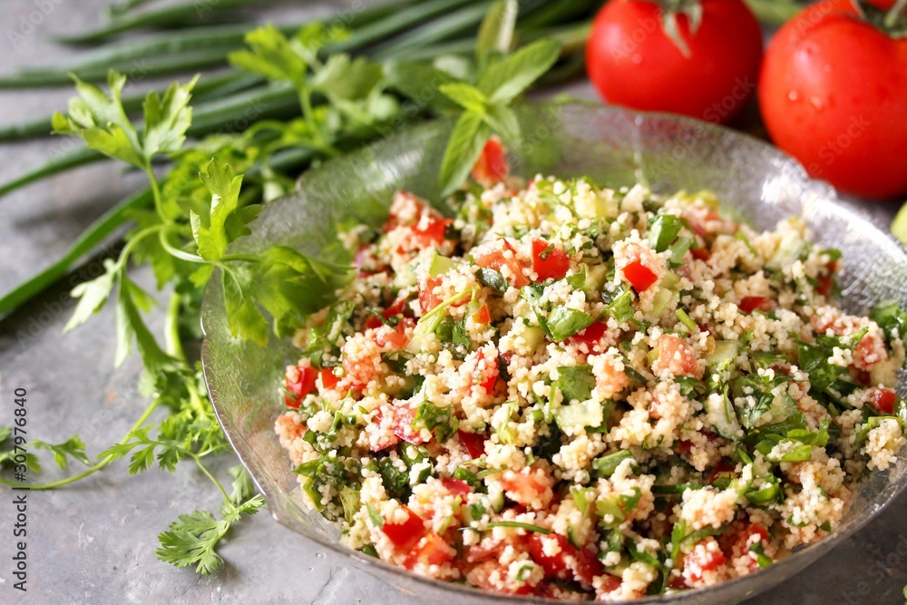 Couscous and herb salad. Israeli Couscous Tabbouleh Salad Stock Photo