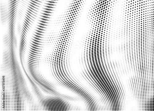 Abstract halftone texture. Chaotic waves of dots. Black and white background