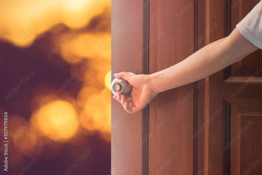 Women hand open door knob or opening the door,grand opening,Close up