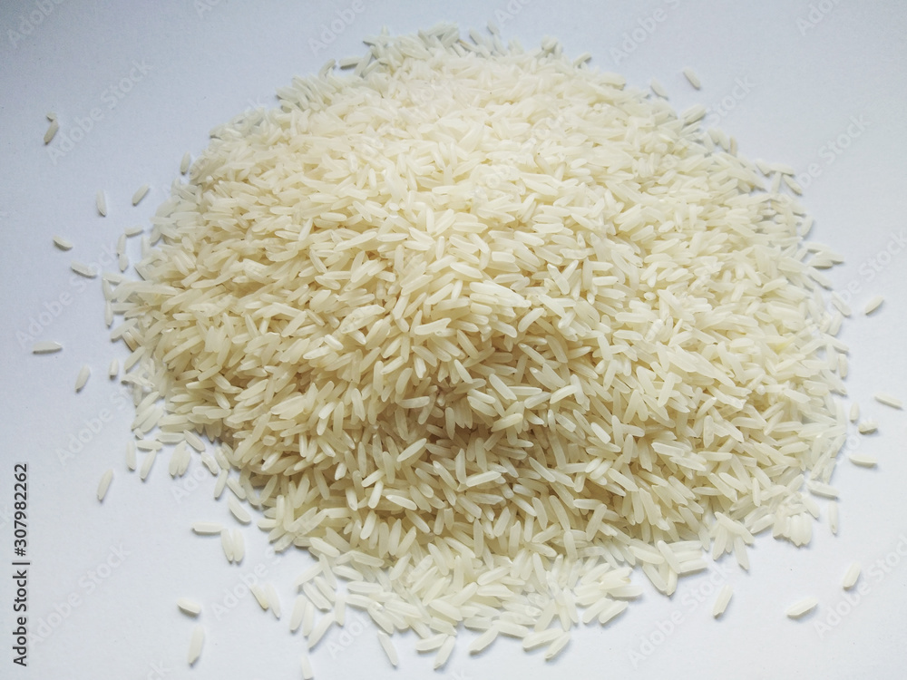 Jasmine rice on white background , close up Jasmine rice on white background , close up