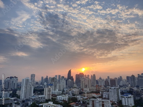 sunset over the city © Sumitta