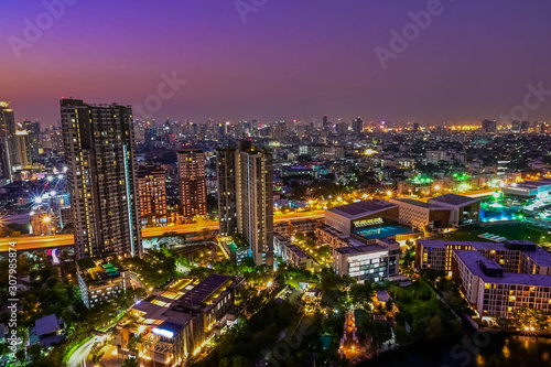 Cityscape of building at night scene in Thailand