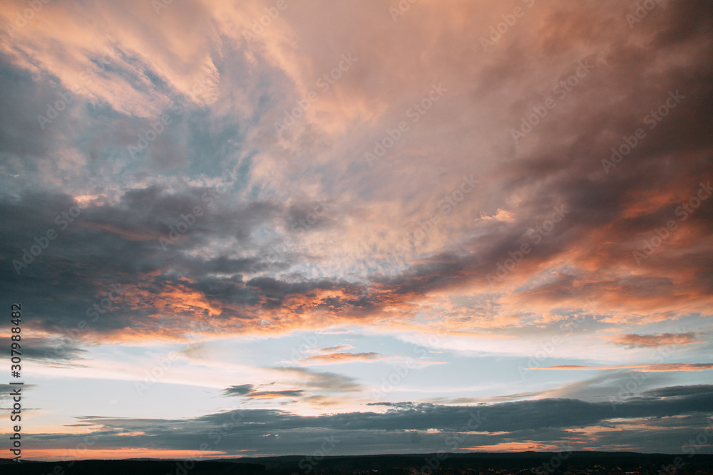 Uniform background for the screensaver. Pink and blue gentle clouds at sunset. Uniform background for the screensaver. Pink and blue gentle clouds at sunset.