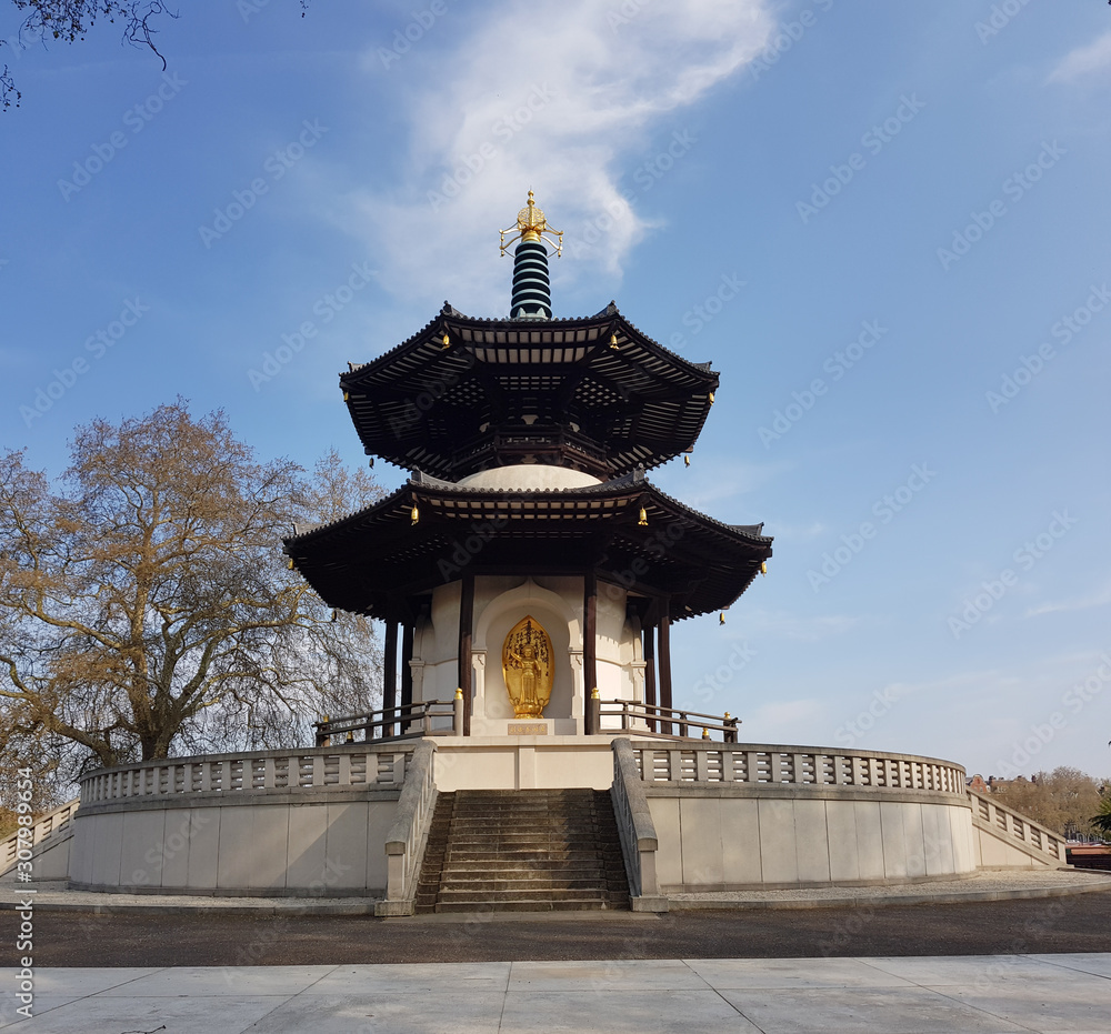 LONDON, UK, APRIL 15TH, 2019. Peace Pagoda temple in Battersea Park by the river Thames, London, UK