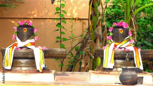 A Statue of Hindu God Shiva Linga in temple, Exterior Traditional Hindu temple, South India. photo