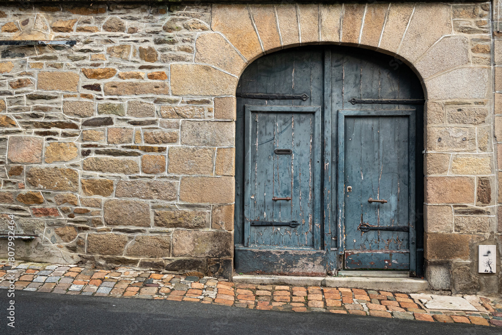 old gray door with a pointy top old gray door with a pointy top