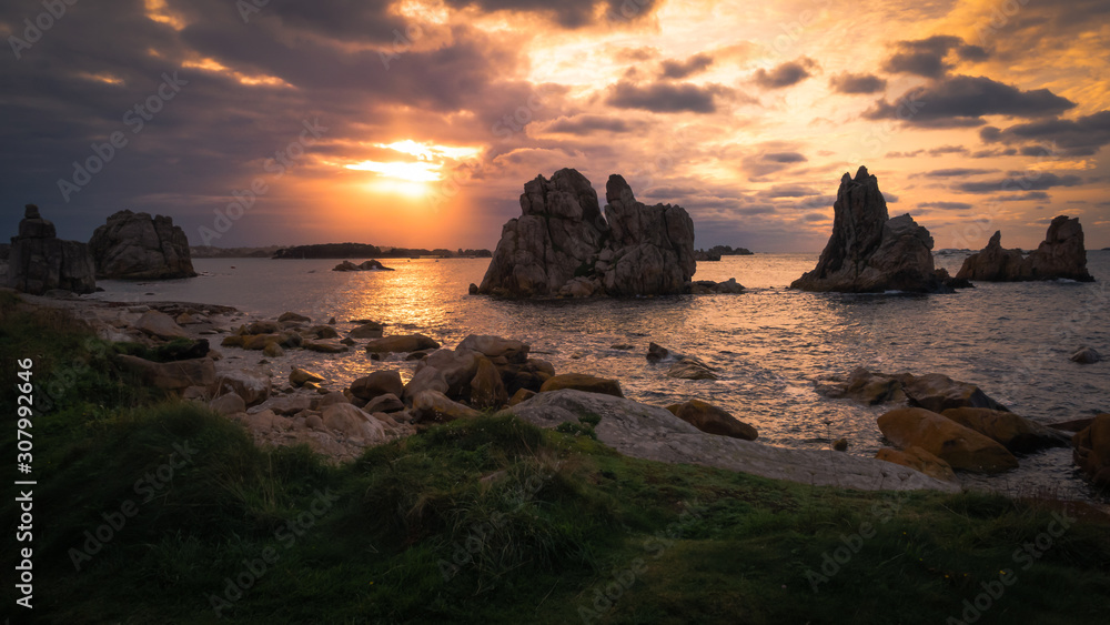 Sunset over a rocky shoreline