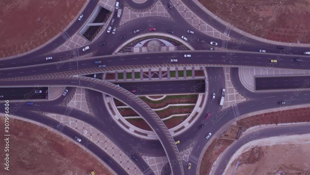 2019 - aerial straight down of traffic circle or roundabout with car traffic, Amman, Jordan. 2019 - aerial straight down of traffic circle or roundabout with car traffic, Amman, Jordan.