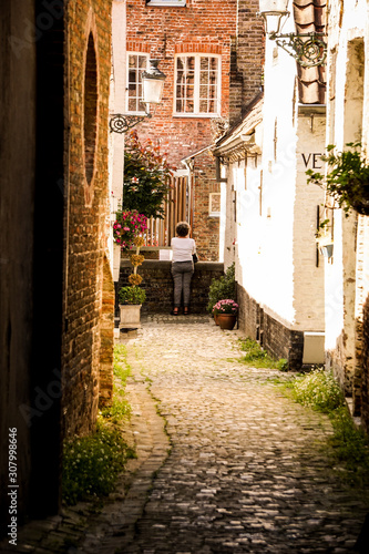 Small and calm street with a view in Bruges  Belgium