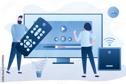 Love couple watch video with remote control and television multimedia box. Smart TV box, smart tv console