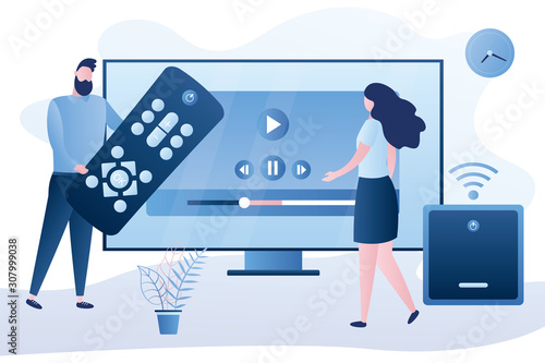 Love couple watch video with remote control and television multimedia box. Smart TV box, smart tv console