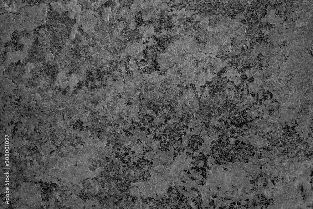 Texture of a concrete wall with cracks and scratches which can be used as a background Texture of a concrete wall with cracks and scratches which can be used as a background