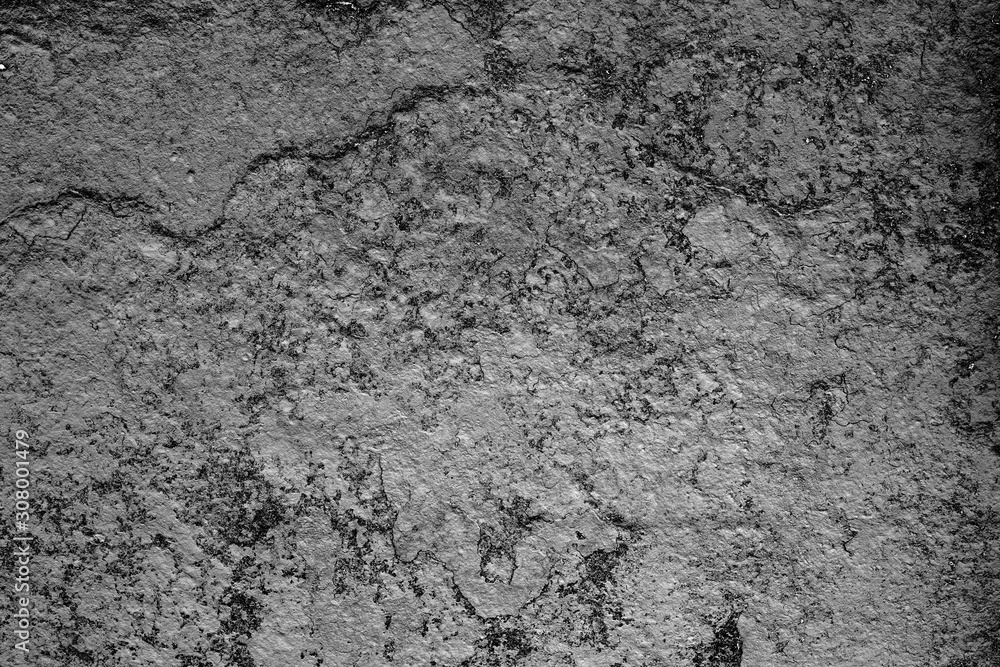 Naklejka premium Texture of a concrete wall with cracks and scratches which can be used as a background