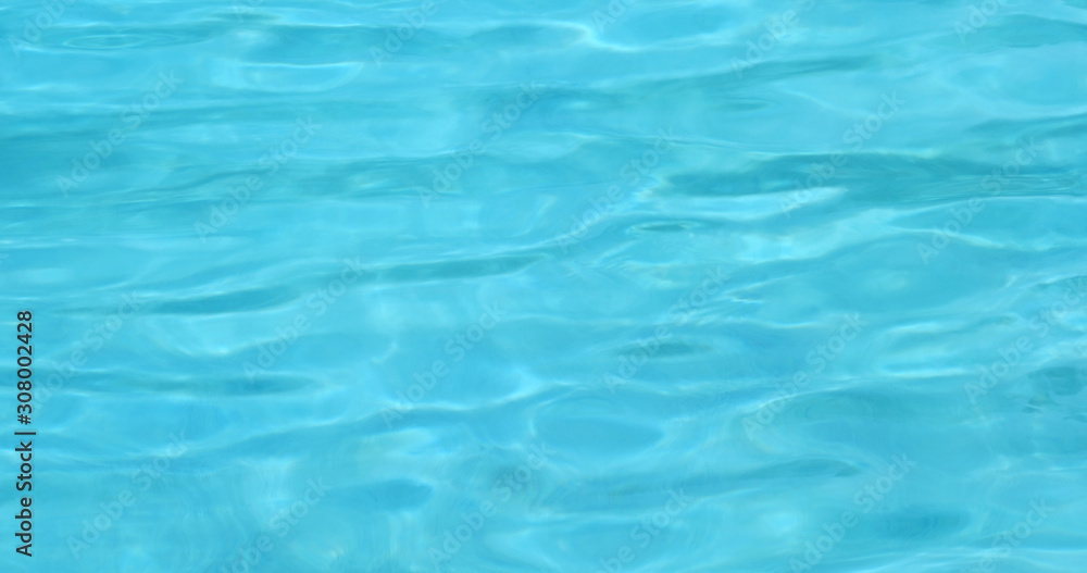 Blue water wave in swimming pool