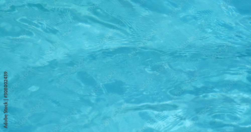 Swimming pool water wave in blue Swimming pool water wave in blue