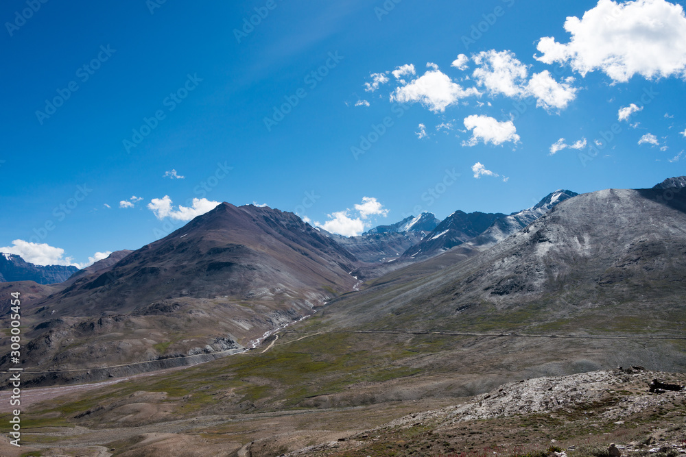 Himachal Pradesh, India - Sep 03 2019 - Spiti Valley view from Kunzum Pass (Kunzum La) - Chandra Taal (Moon Lake) Trekking course in Lahaul and Spiti, Himachal Pradesh, India. Himachal Pradesh, India - Sep 03 2019 - Spiti Valley view from Kunzum Pass (Kunzum La) - Chandra Taal (Moon Lake) Trekking course in Lahaul and Spiti, Himachal Pradesh, India.