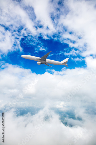 Airplane with propellers flying in blue sky. Commercial aircraft with propellers.