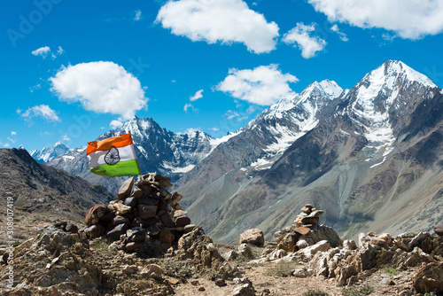 Himachal Pradesh, India - Sep 03 2019 - Indian Flag at Kunzum Pass (Kunzum La) - Chandra Taal (Moon Lake) Trekking course in Lahaul and Spiti, Himachal Pradesh, India.