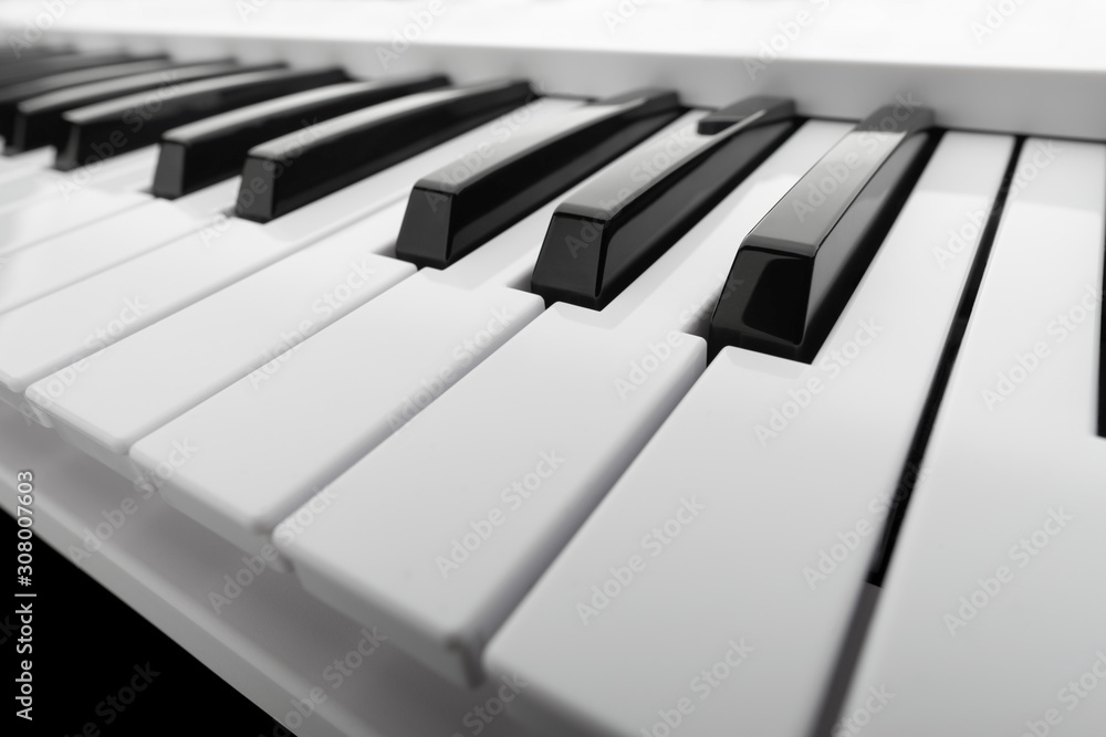 Close up detail on the black and white keys of a music keyboard, with copy space for text Close up detail on the black and white keys of a music keyboard, with copy space for text